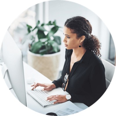 Dental Claim Attachments - woman looking at computer