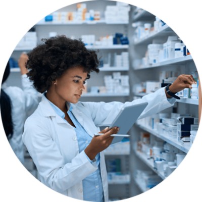 Exchange Dx - female pharmacist looking at tablet