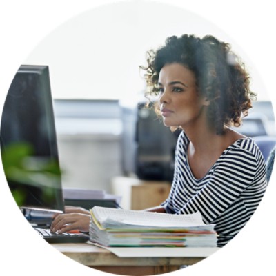 Woman working at a desktop computer