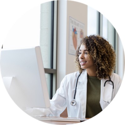 Woman doctor using computer