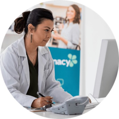 Rx CardFinder Services​ - pharmacist working at computer