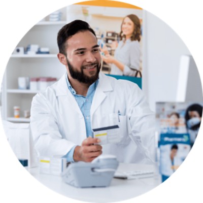 Enterprise Pharmacy System - pharmacist working at computer