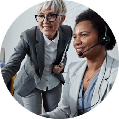 Denials and Appeals Management - two businesswomen working at call center