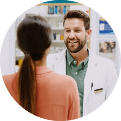 Rx CardFinder Services​ - pharmacist assisting a customer