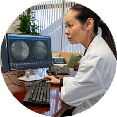 Cardiology PACS - cardiologist at computer