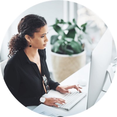 Businesswoman working on a computer in an office