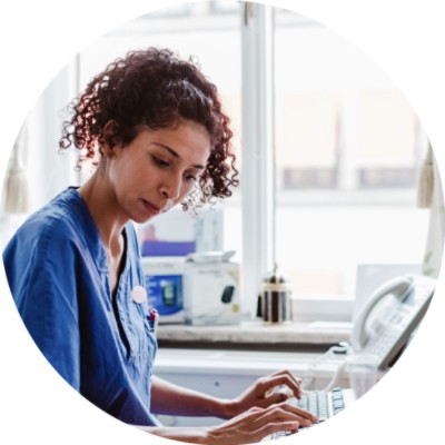 Woman typing on keyboard