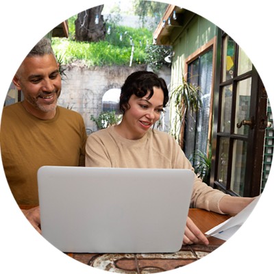 Couple at home working on bills together